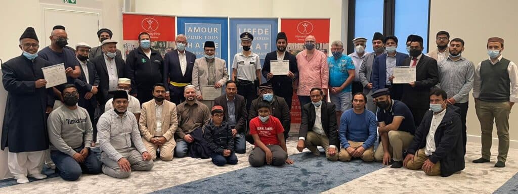 Belgian government awards Ahmadis for services to vaccination centre in Uccle, Brussels