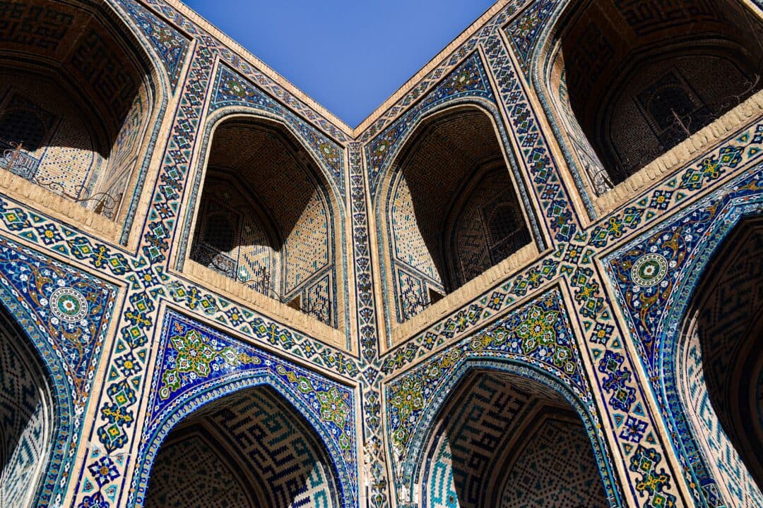 What is the reality of the two angels questioning the deceased in the grave?