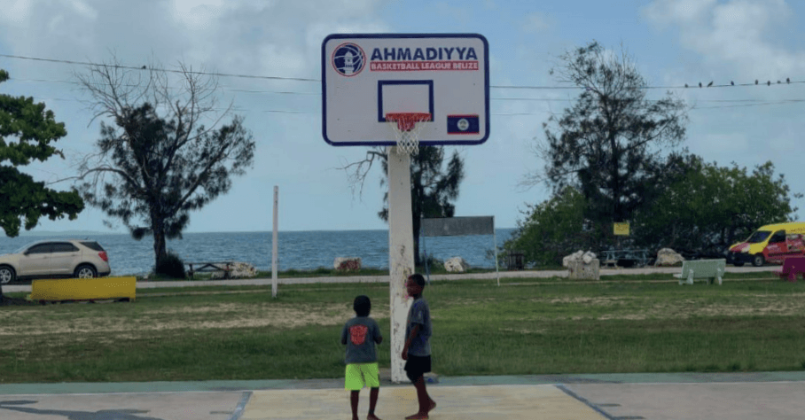 Ahmadis of Belize support vulnerable youth by restoring Basketball courts