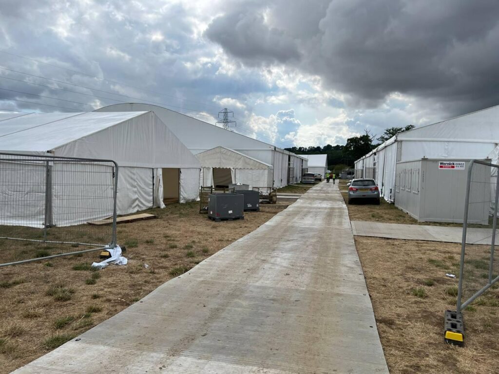 The hustle and bustle before Jalsa Salana UK 2025: Preparations in pictures 12 Tracks are being set in place at the Jalsa site for ease of access