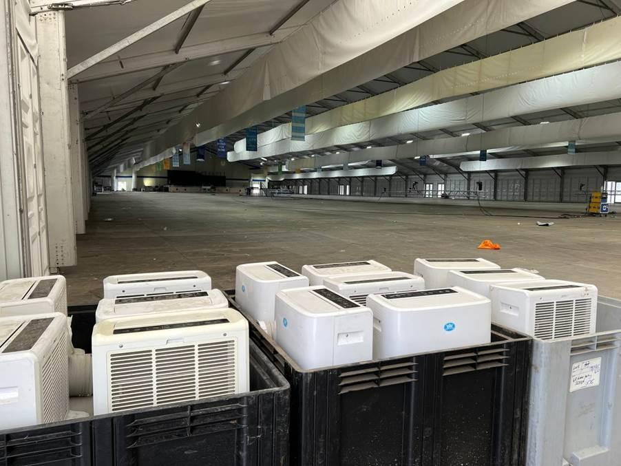 The hustle and bustle before Jalsa Salana UK 2025: Preparations in pictures 4 Air conditioning and ventilation for the marquee are being installed