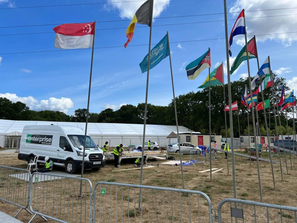 The hustle and bustle before Jalsa Salana UK 2025: Preparations in pictures 23 The flags of Jalsa are being set in place